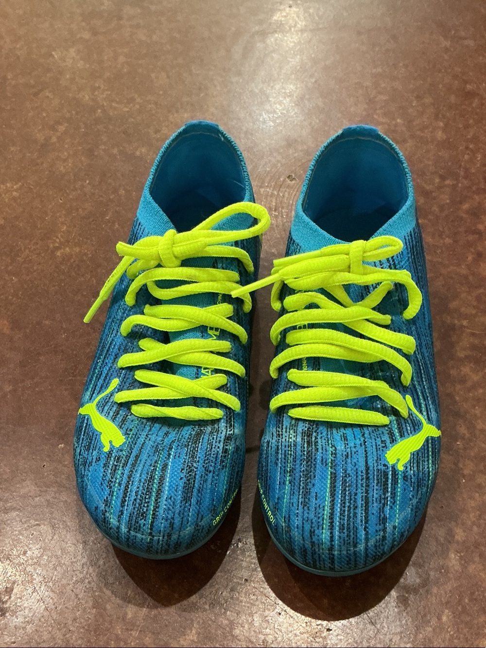 Puma Kids Teal Blue Soccer Shoes with Neon Yellow Laces